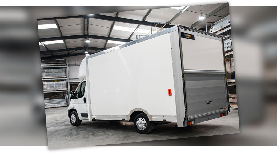 White Luton Van With Closed Tail Lift In Warehouse